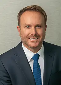 Corporate headshot for financial executive